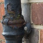 A rusting drainpipe